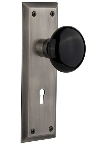 New York Style Door Set with Black Porcelain Knobs in Antique Pewter.